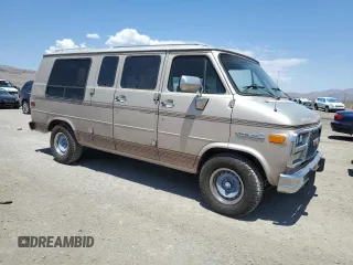 1994 GMC Vandura z VIN 1GDEG25K4RF512695, wystawiony jako Copart lot #63562414 z przebiegiem 171 855 mil mil oraz Szkody całkowita. Historia ofert i sprzedaży dostępna na DreamBid. Obrazek 4.