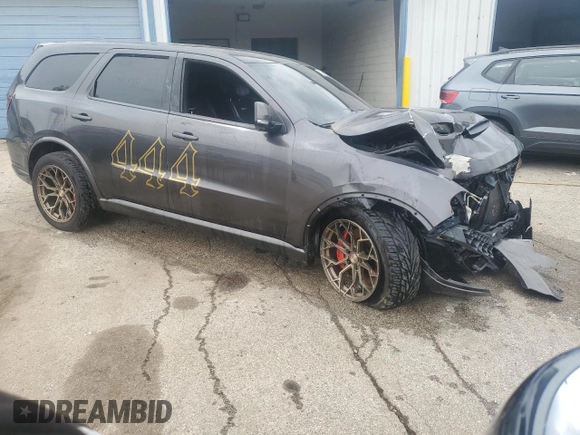2018 Dodge Durango SRT with VIN 1C4SDJGJ6JC232667, listed as a Copart auction lot 57871095 with 54,945 mi miles and Salvage title. Bid and sale history available at DreamBid. Image 4.
