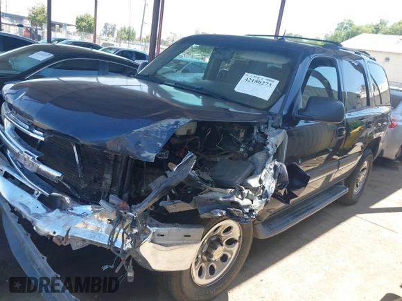 2005 Chevrolet Tahoe LS with VIN 1GNEC13V25R164239, listed as a IAAI auction lot 42180273 with 221,542 mi miles and . Bid and sale history available at DreamBid. Image 2.