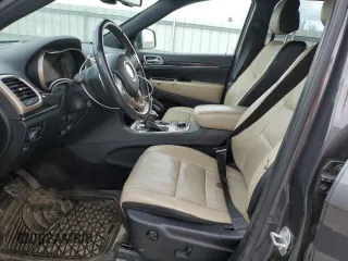 2016 Jeep Grand Cherokee Limited 75th Anniversary with VIN 1C4RJFBG4GC489464, listed as a Copart auction lot 55278935 with 176,572 mi miles and Salvage Title. Bid and sale history available at DreamBid. Image 7.