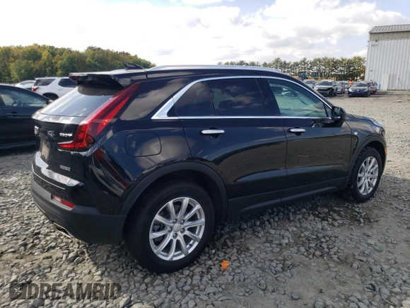 2023 Cadillac XT4 AWD Luxury with VIN 1GYFZBR49PF101377, listed as a Copart auction lot 73961294 with 26,847 mi miles and Salvage Title. Bid and sale history available at carsss.com. Image 3.