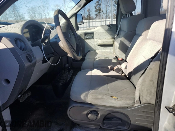 2005 Ford F-150 XL with VIN 1FTRF14535NB98598, listed as a Copart auction lot 88928675 with 214,304 mi miles and Salvage Title. Bid and sale history available at carsss.com. Image 7.