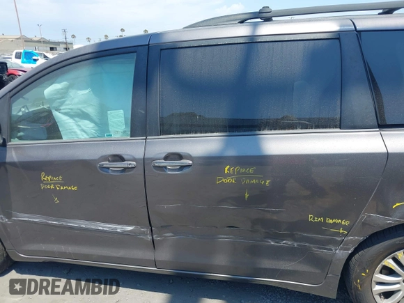 2015 Toyota Sienna XLE with VIN 5TDYK3DC2FS686969, listed as a IAAI auction lot 42559541 with 103,190 mi miles and . Bid and sale history available at DreamBid. Image 14.