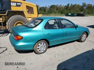 2000 Hyundai Elantra GLS z VIN KMHJF35FXYU998689, wystawiony jako Copart lot #76181814 z przebiegiem 154 743 mil mil oraz Szkoda całkowita • Salvage title. Historia ofert i sprzedaży dostępna na DreamBid. Obrazek 3.