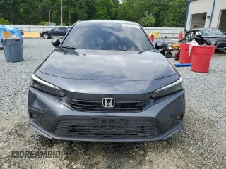 2024 Honda Civic Touring z VIN 2HGFE1F96RH324748, wystawiony jako Copart lot #58833725 z przebiegiem Nie podano mil oraz Szkoda całkowita • Salvage title. Historia ofert i sprzedaży dostępna na DreamBid. Obrazek 5.