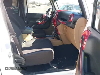 2016 Jeep Wrangler Unlimited Rubicon Hard Rock with VIN 1C4HJWFG9GL296782, listed as a IAAI auction lot 41595273 with 113,338 mi miles. Bid and sale history available at carsss.com. Image 5.