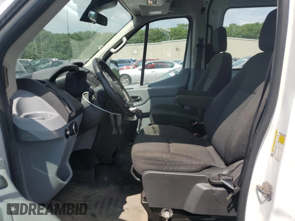 2016 Ford Transit Cargo with VIN 1FTYR2CM1GKB43234, listed as a Copart auction lot 65311135 with 59,502 mi miles and Salvage title. Bid and sale history available at DreamBid. Image 7.