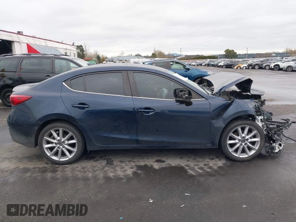 2017 Mazda 3 Touring with VIN 3MZBN1V72HM103660, listed as a IAAI auction lot 41588084 with 95,184 mi miles and . Bid and sale history available at DreamBid. Image 12.