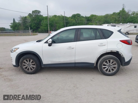 2016 Mazda CX-5 Sport with VIN JM3KE2BY1G0875484, listed as a IAAI auction lot 41838122 with 166,986 mi miles. Bid and sale history available at carsss.com. Image 14.