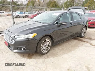2015 Ford Fusion Titanium with VIN 3FA6P0K99FR268450, listed as a IAAI auction lot 41805513 with 202,009 mi miles. Bid and sale history available at carsss.com. Image 2.