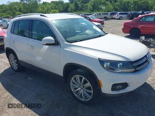 2014 Volkswagen Tiguan SE z VIN WVGAV3AX4EW545279, wystawiony jako IAAI lot #42282402 z przebiegiem 144 328 mil mil oraz . Historia ofert i sprzedaży dostępna na DreamBid. Obrazek 1.