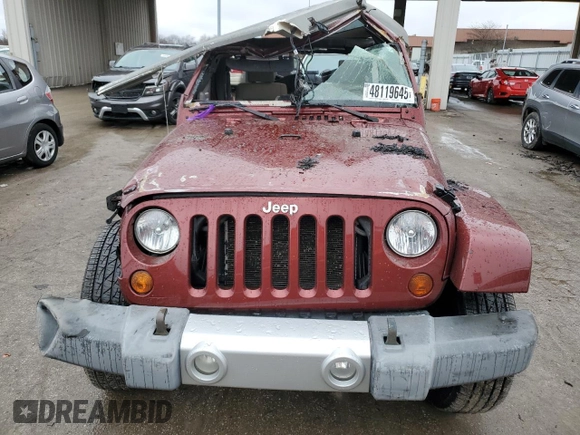2010 Jeep Wrangler Unlimited Sahara with VIN 1J4BA5H10AL103638, listed as a Copart auction lot 48119645 with 0 mi miles and Salvage Title. Bid and sale history available at carsss.com. Image 5.