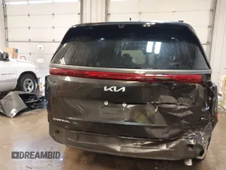 2025 Kia Carnival SX with VIN KNDNE5K33S6467800, listed as a IAAI auction lot 41624780 with 4,456 mi miles and . Bid and sale history available at DreamBid. Image 17.