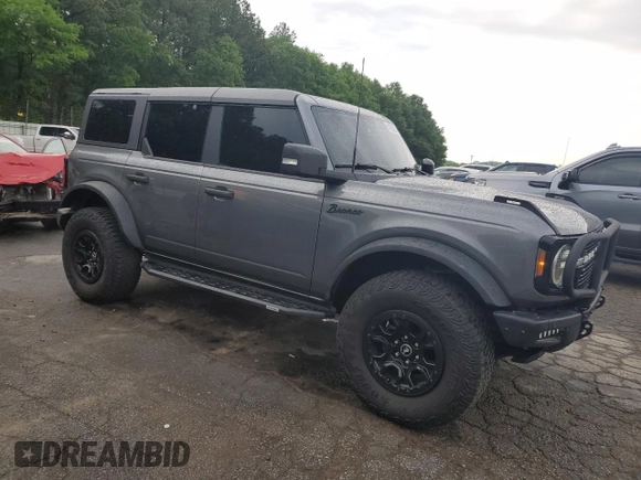 2022 Ford Bronco с VIN 1FMEE5DP5NLB44740, выставлен на аукционе Copart как лот 54820505 с пробегом 49 767 миль миль и Списание • Salvage title. История ставок и продаж доступна на DreamBid. Изображение 4.