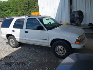 2003 Chevrolet Blazer LS z VIN 1GNDT13X33K150515, wystawiony jako IAAI lot #42363650 z przebiegiem 165 755 mil mil oraz . Historia ofert i sprzedaży dostępna na DreamBid. Obrazek 1.