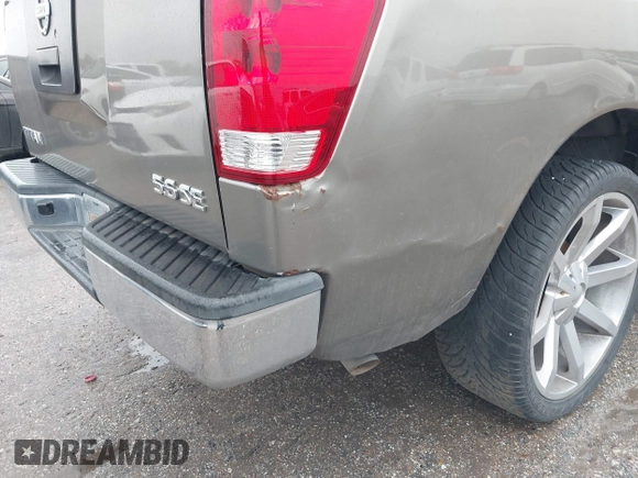 2007 Nissan Titan XE with VIN 1N6BA07A87N219609, listed as a IAAI auction lot 41451297 with 300,263 mi miles. Bid and sale history available at carsss.com. Image 12.
