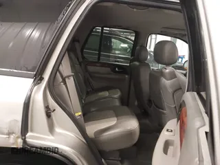 2003 GMC Envoy SLT with VIN 1GKDT13S932395367, listed as a IAAI auction lot 41544810 with 142,012 mi miles. Bid and sale history available at carsss.com. Image 8.