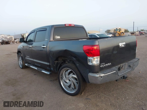 2013 Toyota Tundra Limited with VIN 5TFFY5F19DX137337, listed as a IAAI auction lot 41848771 with 182,886 mi miles and . Bid and sale history available at DreamBid. Image 3.