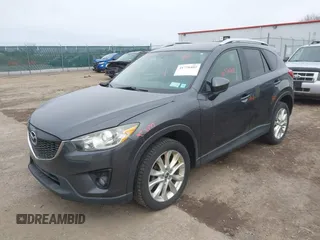 2014 Mazda CX-5 Grand Touring with VIN JM3KE4DY4E0343863, listed as a IAAI auction lot 41770402 with 117,615 mi miles. Bid and sale history available at carsss.com. Image 2.
