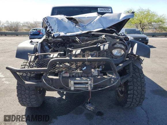 2014 Jeep Wrangler Unlimited Rubicon X with VIN 1C4BJWFG2EL308077, listed as a Copart auction lot 54439265 with 160,746 mi miles and Salvage title. Bid and sale history available at DreamBid. Image 5.