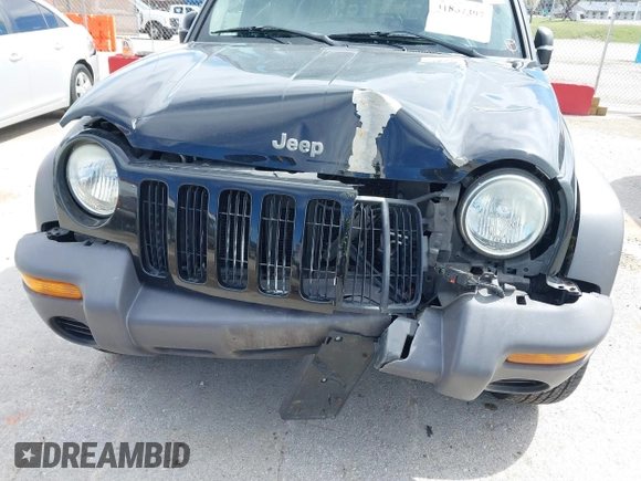 2003 Jeep Liberty Sport with VIN 1J4GL48KX3W530569, listed as a IAAI auction lot 41857397 with 172,303 mi miles. Bid and sale history available at carsss.com. Image 6.
