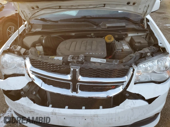 2017 Dodge Grand Caravan SXT with VIN 2C4RDGCG1HR750697, listed as a Copart auction lot 83490934 with 169,817 mi miles and Salvage Title. Bid and sale history available at DreamBid. Image 11.