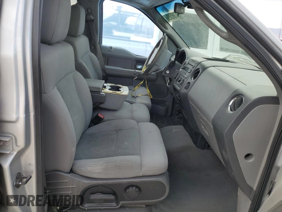 2005 Ford F-150 XLT with VIN 1FTRW12W35KC32505, listed as a Copart auction lot 54786525 with 149,614 mi miles and Salvage title. Bid and sale history available at DreamBid. Image 7.