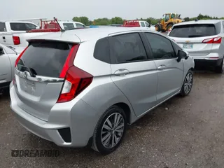 2016 Honda Fit EX with VIN JHMGK5H77GX022973, listed as a IAAI auction lot 42087380 with 96,439 mi miles and . Bid and sale history available at DreamBid. Image 4.