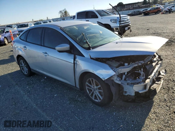2018 Ford Focus SE with VIN 1FADP3F23JL226448, listed as a Copart auction lot 43877055 with 77,253 mi miles and Salvage Title. Bid and sale history available at carsss.com. Image 4.
