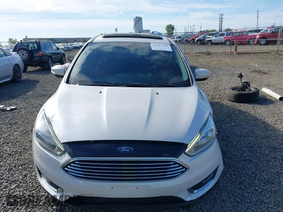 2017 Ford Focus Titanium with VIN 1FADP3N24HL308751, listed as a IAAI auction lot 42207247 with 109,736 mi miles and . Bid and sale history available at DreamBid. Image 13.