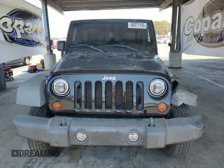 2011 Jeep Wrangler Unlimited Rubicon with VIN 1J4HA6H1XBL589103, listed as a Copart auction lot 59371155 with 156,320 mi miles and Salvage title. Bid and sale history available at DreamBid. Image 5.