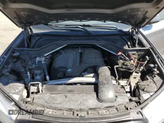 2014 BMW X5 xDrive35i with VIN 5UXKR0C54E0K51955, listed as a Copart auction lot 50051535 with 132,871 mi miles and Salvage Title. Bid and sale history available at carsss.com. Image 12.