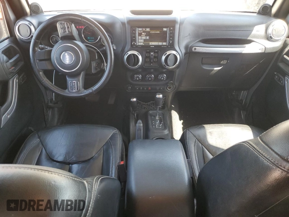 2013 Jeep Wrangler Unlimited Sahara with VIN 1C4BJWEG5DL662756, listed as a Copart auction lot 56423615 with 189,355 mi miles and Salvage title. Bid and sale history available at DreamBid. Image 8.