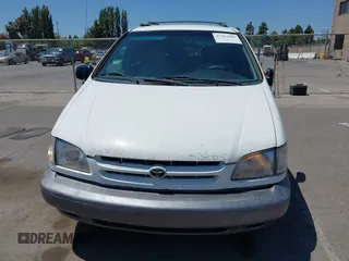 2000 Toyota Sienna CE z VIN 4T3GF19C8YU307987, wystawiony jako IAAI lot #42363309 z przebiegiem 179 374 mil mil oraz . Historia ofert i sprzedaży dostępna na DreamBid. Obrazek 12.
