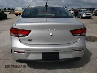 2022 Kia Rio LX with VIN 3KPA24AD2NE506127, listed as a Copart auction lot 63672404 with Not Provided miles and Salvage Title. Bid and sale history available at DreamBid. Image 6.