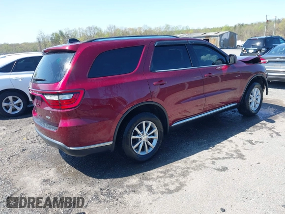2018 Dodge Durango SXT with VIN 1C4RDJAG2JC133887, listed as a IAAI auction lot 41919409 with 98,692 mi miles and . Bid and sale history available at DreamBid. Image 4.