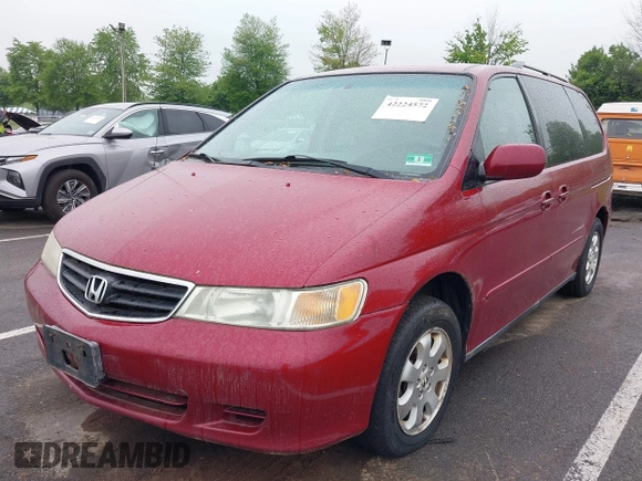 2003 Honda Odyssey EX-L with VIN 5FNRL18993B009180, listed as a IAAI auction lot 42224572 with 187,781 mi miles and . Bid and sale history available at DreamBid. Image 2.