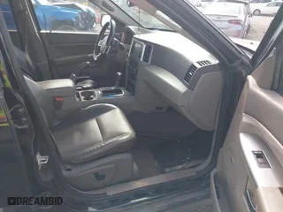 2009 Jeep Grand Cherokee Laredo with VIN 1J8GS48K59C548330, listed as a IAAI auction lot 41887548 with 184,434 mi miles. Bid and sale history available at carsss.com. Image 5.