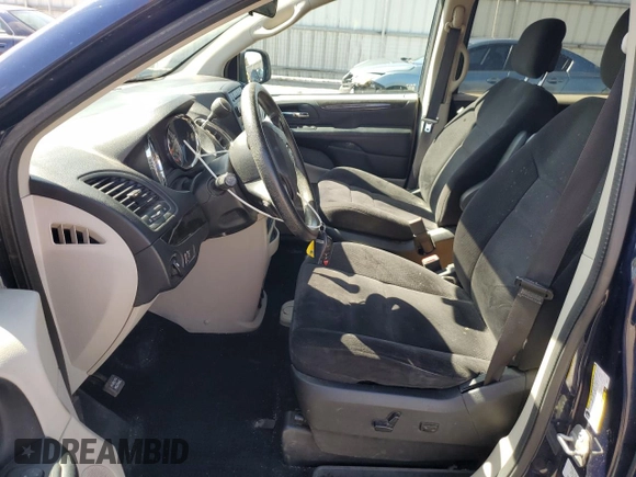 2014 Dodge Grand Caravan SE with VIN 2C4RDGBG4ER400512, listed as a Copart auction lot 52416965 with 141,475 mi miles and Clean Title. Bid and sale history available at DreamBid. Image 7.