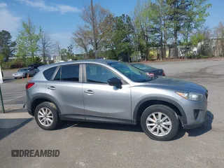 2014 Mazda CX-5 Touring with VIN JM3KE2CY9E0310315, listed as a IAAI auction lot 41943991 with 98,359 mi miles and . Bid and sale history available at carsss.com. Image 13.
