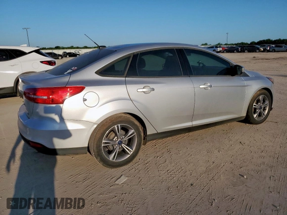 2018 Ford Focus SE z VIN 1FADP3F2XJL277462, wystawiony jako Copart lot #60360985 z przebiegiem 81 831 mil mil oraz Czysty tytuł • Clean title. Historia ofert i sprzedaży dostępna na DreamBid. Obrazek 3.