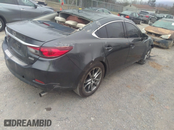 2014 Mazda 6 i Grand Touring with VIN JM1GJ1W60E1160555, listed as a IAAI auction lot 41785387 with Not Provided miles. Bid and sale history available at carsss.com. Image 4.