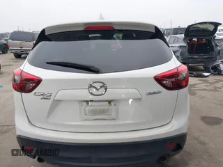 2016 Mazda CX-5 Grand Touring with VIN JM3KE4DY7G0737232, listed as a IAAI auction lot 42158279 with Not Provided miles and . Bid and sale history available at DreamBid. Image 16.
