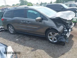 2019 Honda Odyssey EX-L z VIN 5FNRL6H70KB093724, wystawiony jako IAAI lot #42737608 z przebiegiem Nie podano mil oraz . Historia ofert i sprzedaży dostępna na DreamBid. Obrazek 1.