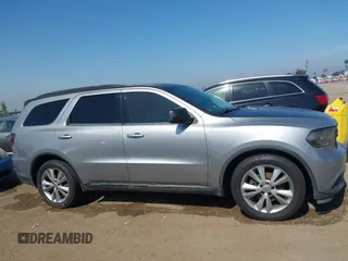 2014 Dodge Durango SXT with VIN 1C4RDHAG6EC593388, listed as a IAAI auction lot 42339302 with 170,746 mi miles and . Bid and sale history available at DreamBid. Image 13.