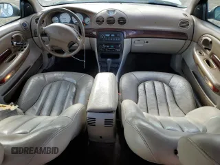 1999 Chrysler 300M M z VIN 2C3HE66G7XH727061, wystawiony jako Copart lot #51304975 z przebiegiem 150 213 mil mil oraz Szkody całkowita. Historia ofert i sprzedaży dostępna na DreamBid. Obrazek 8.