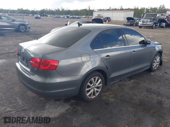 2014 Volkswagen Jetta SE with VIN 3VWD07AJ9EM277085, listed as a IAAI auction lot 42531957 with 171,613 mi miles and . Bid and sale history available at DreamBid. Image 4.