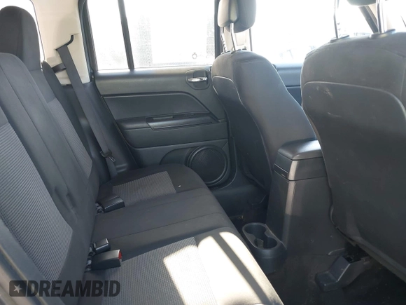 2014 Jeep Patriot Sport with VIN 1C4NJPBA0ED690284, listed as a IAAI auction lot 42513472 with 148,979 mi miles and . Bid and sale history available at DreamBid. Image 8.