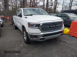 2020 Ram 1500 with VIN 1C6RRERG6LN229520, listed as a IAAI auction lot 41571774 with 102,908 mi miles and . Bid and sale history available at DreamBid. Image 1.
