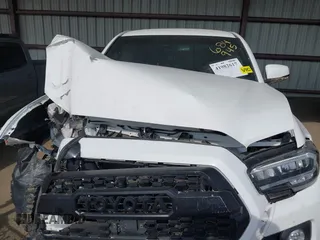 2021 Toyota Tacoma SR z VIN 3TMCZ5AN4MM373247, wystawiony jako IAAI lot #41982617 z przebiegiem 45 692 mil mil oraz . Historia ofert i sprzedaży dostępna na DreamBid. Obrazek 10.